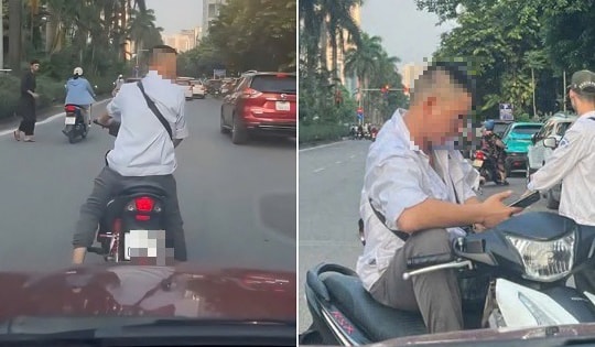 Xôn xao clip người đàn ông ngang nhiên chặn đường, đòi tiền đỗ xe ở Hà Nội