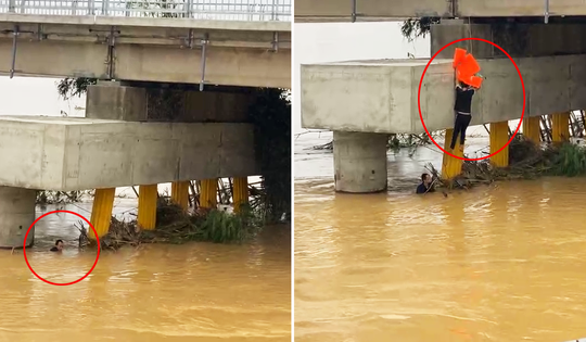 'Thót tim' cảnh nam thanh niên đu dây xuống chân cầu nước chảy cuồn cuộn cứu người