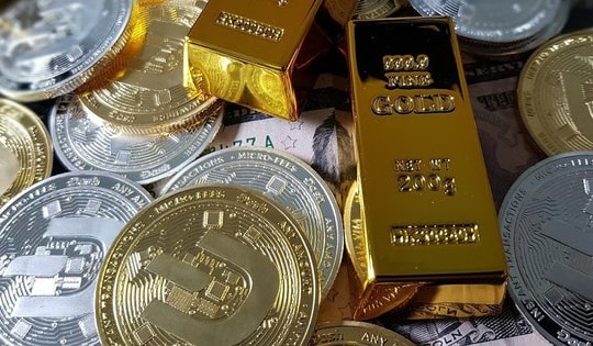 Vàng, bạc thế giới đối diện áp lực chốt lời