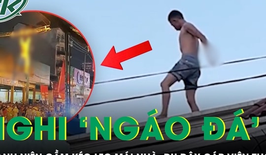 Thanh niên nghi ‘ngáo đá’ cầm kéo leo mái nhà, đu dây cáp viễn thông khiến cả khu phố náo loạn