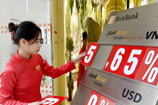 Lãi suất ngân hàng hôm nay 25/6/2026: Cuộc đua cộng thêm hạ nhiệt, cao nhất 7,7%