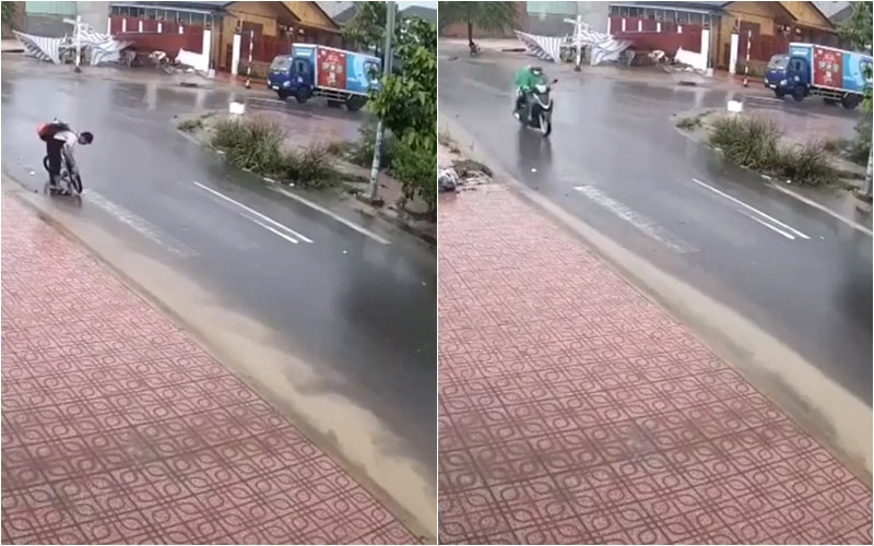 Clip: Cậu học sinh dừng xe đạp dưới trời mưa dùng tay thông cống thoát nước khiến dân mạng nể phục
