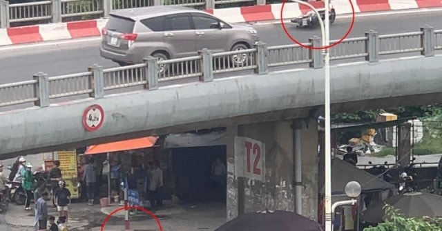 Người đi xe máy đâm phải lan can đường dẫn cầu Vĩnh Tuy rồi rơi xuống đất