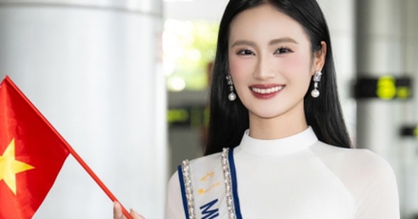 Hoa hậu Ý Nhi rạng rỡ trong tà áo dài trắng khi trở về từ Miss World